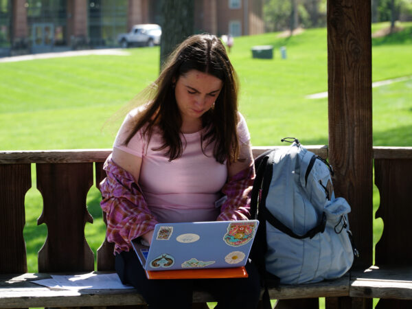 Student studying on Campus lawn